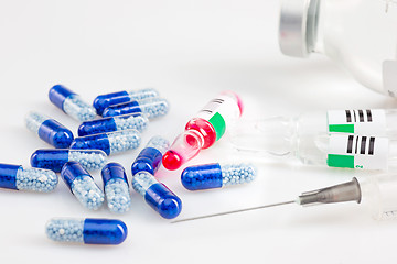 Image showing Blue capsules and pills background