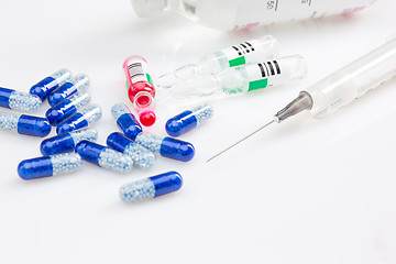 Image showing Blue capsules and pills background