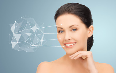 Image showing woman face with low poly projection and pointers