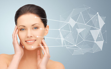 Image showing woman face with low poly projection and pointers