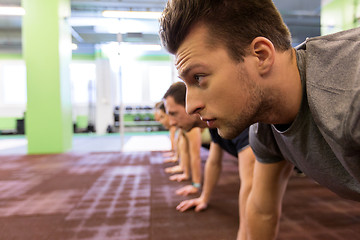 Image showing group of people exercising in gym