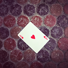 Image showing Ace of hearts card on the floor