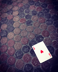 Image showing Ace of hearts card on the dirty floor