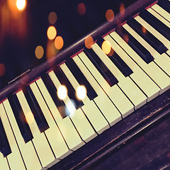 Image showing Retro piano keys with bokeh lights