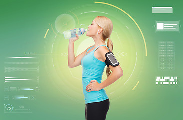 Image showing woman training drinking water from bottle