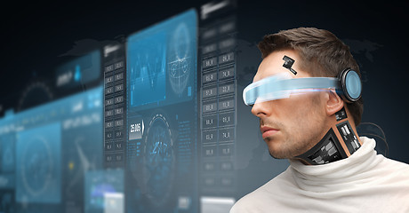 Image showing man in virtual reality glasses and microchip