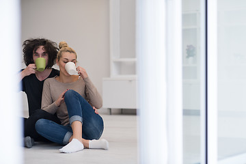 Image showing young couple in their new home