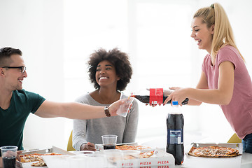 Image showing multiethnic group of young people have a lunch break