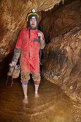 Image showing Caving barefoot in water