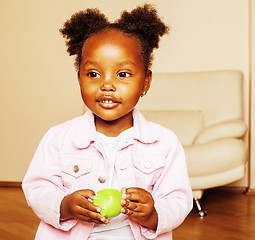 Image showing little cute african american girl playing with animal toys at ho