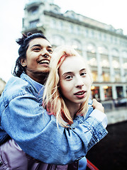 Image showing Two teenage girls infront of university building smiling, having