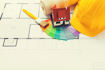 Image showing close up of house blueprint with building tools