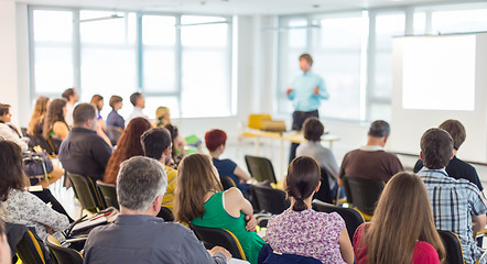 Image showing Speaker giving presentation on business conference.