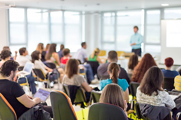 Image showing Speaker giving presentation on business conference.