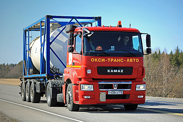 Image showing Red Kamaz Truck T1840 Tank Container Transport on Sunny Day