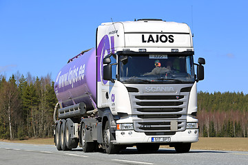 Image showing White Scania Semi R410 Tank Truck Purple Trailer