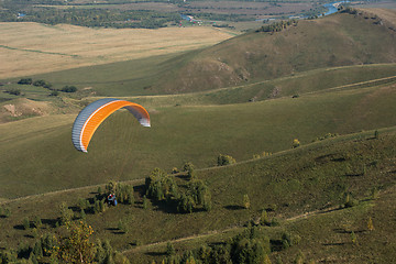 Image showing Paragliding in mountains