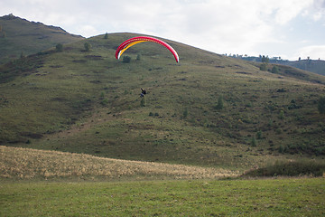 Image showing Paragliding in mountains