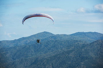 Image showing Paragliding in mountains