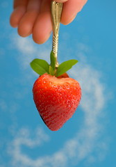 Image showing A heart shaped strawberry in spoon