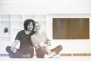 Image showing young couple in their new home