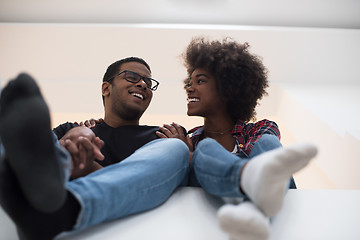 Image showing couple having break during moving to new house