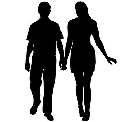 Image showing Silhouette man and woman walking hand in hand