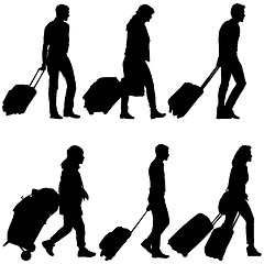 Image showing Set black silhouettes travelers with suitcases on white background. illustration