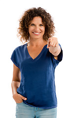 Image showing Happy mature woman pointing