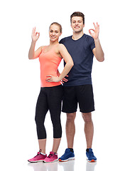 Image showing happy sportive man and woman