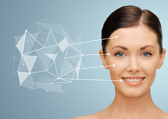 Image showing woman face with low poly projection and pointers