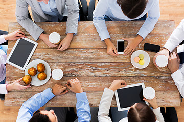 Image showing businesspeople with smartphones and tablet pc