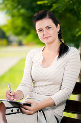 Image showing Business woman in summer park