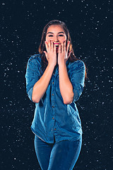 Image showing Young beautiful woman under splash of rain