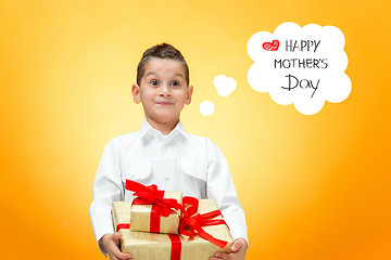 Image showing The boy with gift box