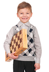 Image showing Little boy with chessboard