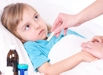 Image showing Sick little girl in bed