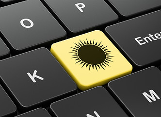 Image showing Travel concept: Sun on computer keyboard background