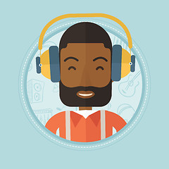 Image showing Man listening to music in headphones.
