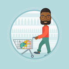 Image showing Customer walking in store with shopping trolley.