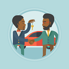 Image showing Car salesman giving key to new owner.