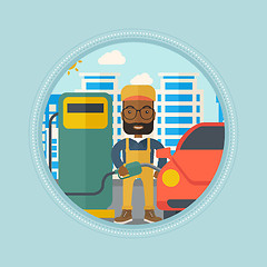 Image showing Worker filling up fuel into car.