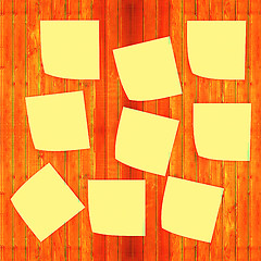 Image showing Mock-up of Sticky note paper on a wooden wall. 3D illustration. 