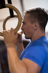 Image showing man doing dipping exercise