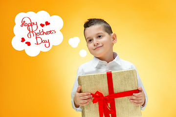 Image showing The boy with gift box