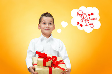 Image showing The boy with gift box