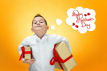 Image showing The boy with gift box