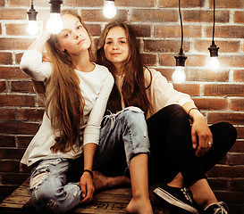 Image showing best friends teenage girls together having fun, posing emotional on white background, besties happy smiling, lifestyle people concept