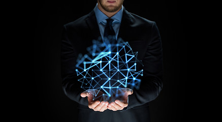 Image showing close up of businessman with network projection