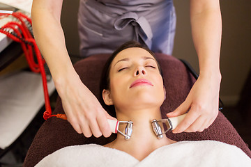 Image showing woman having hydradermie facial treatment in spa